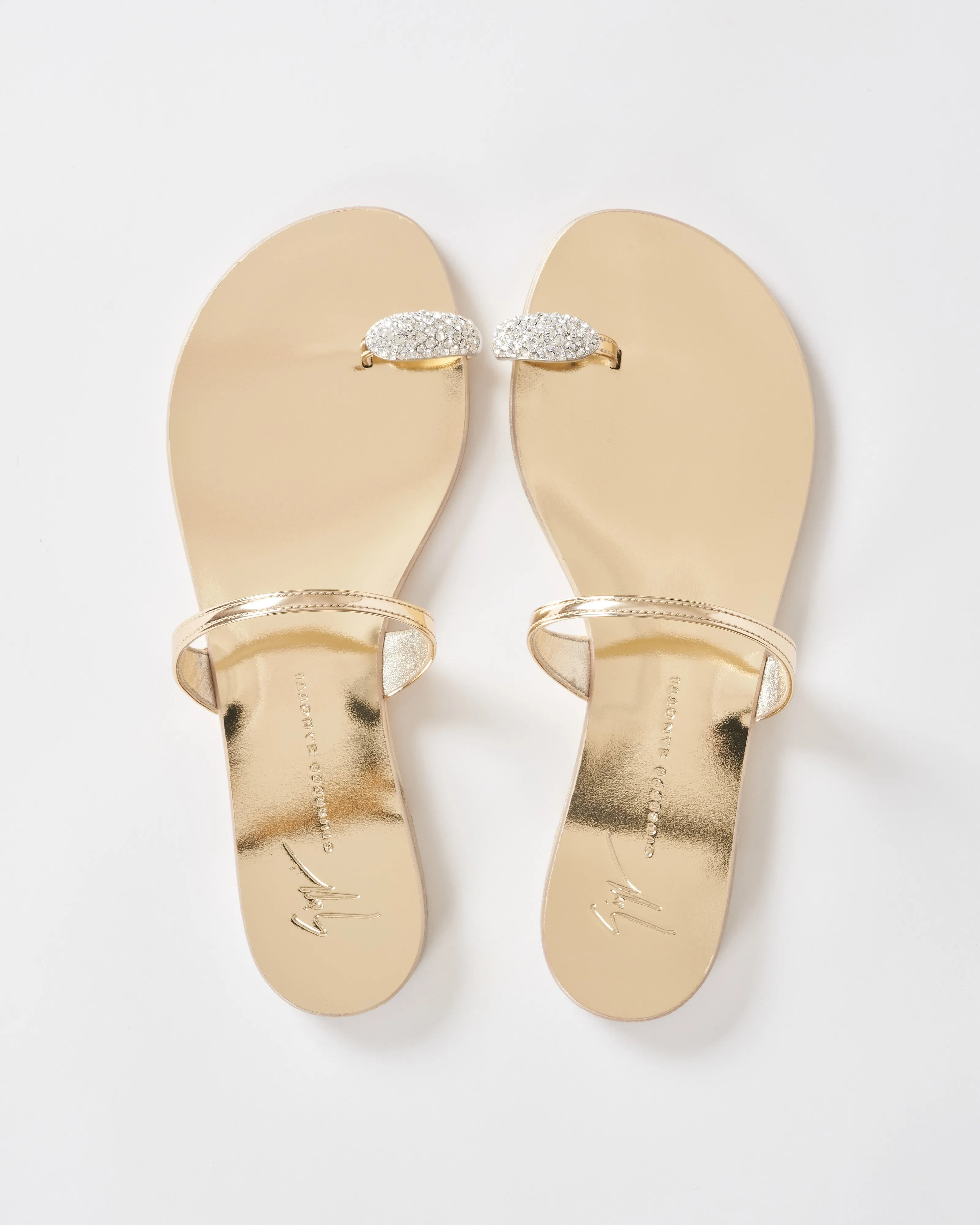 flat sandal with toe ring
